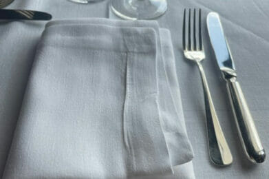 Simple Table Setting at the finest cafe in France. Note the placement of the silverware and proper table setting.
